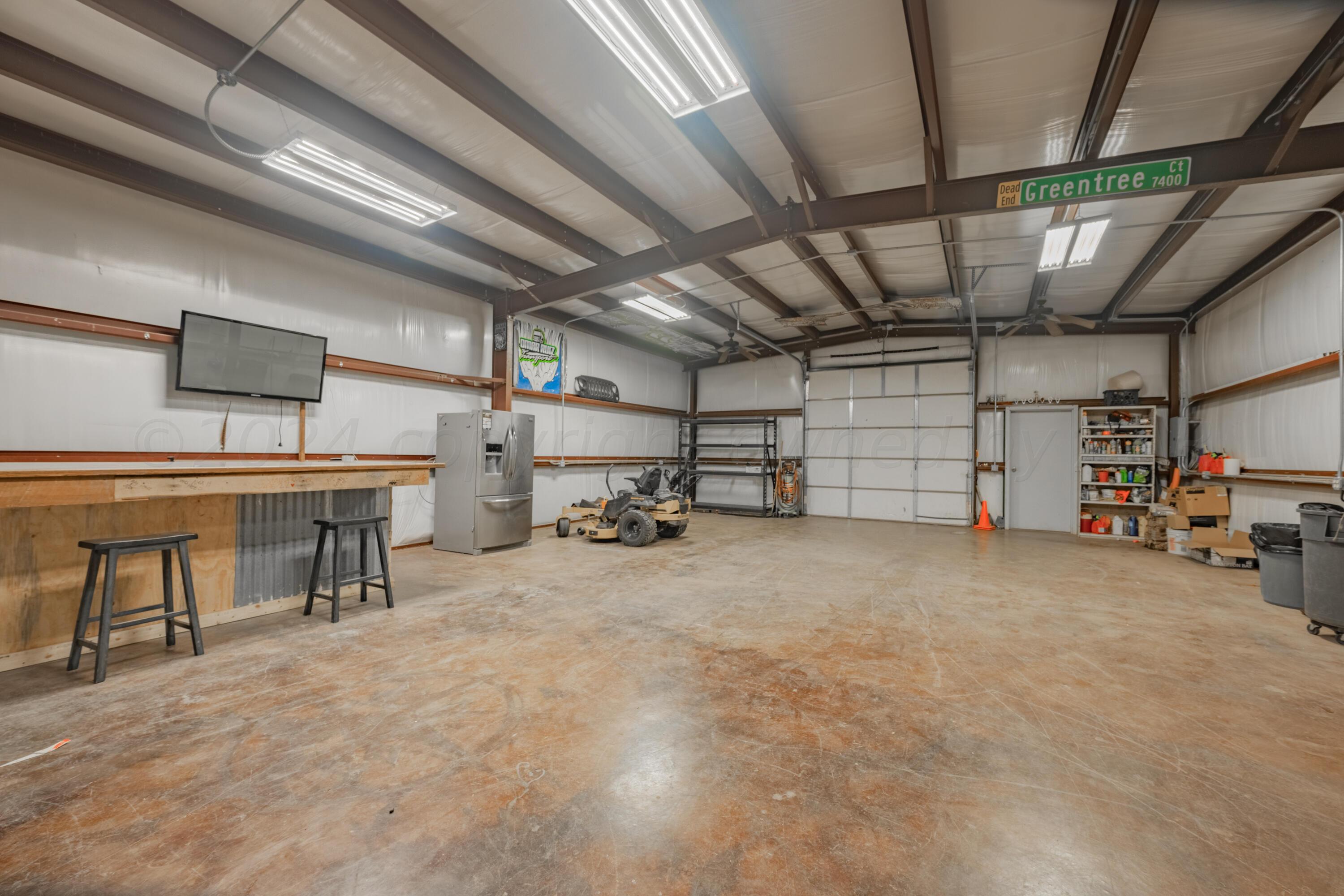 8701 Foxtail Street Amarillo, TX 79118 - Photo 33 of 33 a view of a garage with furniture