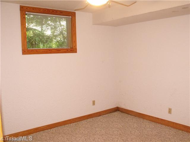 120 Riverside Court Lexington, NC 27292 - Photo 13 of 16 2nd Bedroom. Basement level bedroom