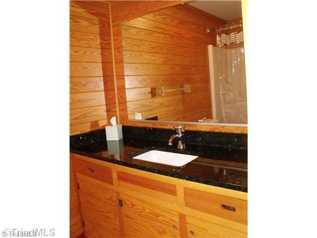 120 Riverside Court Lexington, NC 27292 - Photo 15 of 16 Master Bath/Spa. Granite counters and solid wood Natural