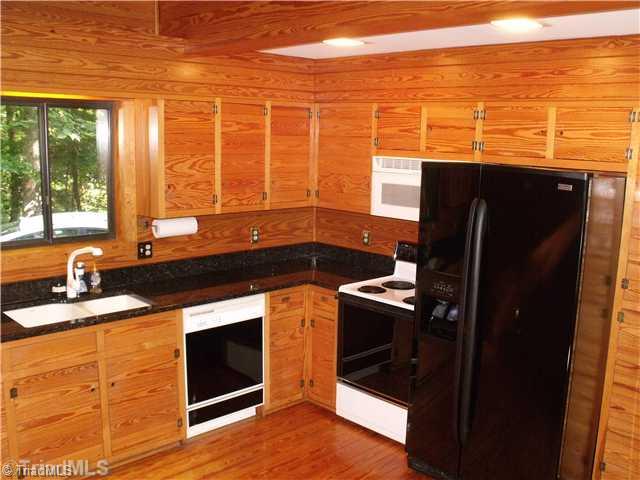 120 Riverside Court Lexington, NC 27292 - Photo 9 of 16 Kitchen. Natural wood and granite counters Simply Beautiful