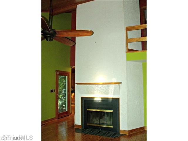 120 Riverside Court Lexington, NC 27292 - Photo 10 of 16 Living Room. Real wood burning fireplace plus built in shelves for entertainment area.