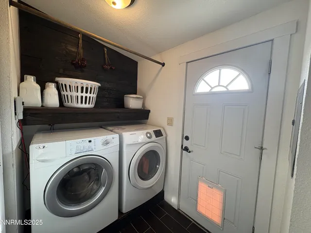 a view of washer and dryer in a utility room