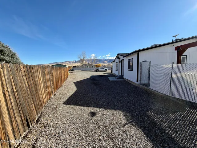 a front view of a house with yard