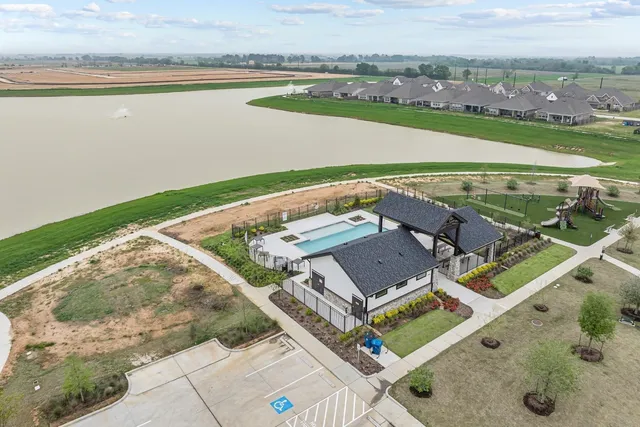 an aerial view of a house with a outdoor space