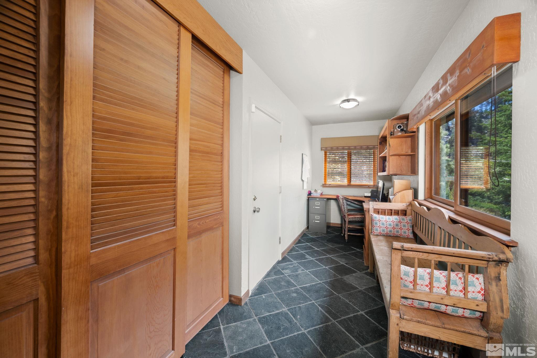 310 Barton Drive Stateline, NV 89449 - Photo 15 of 36 a balcony with furniture and a gate