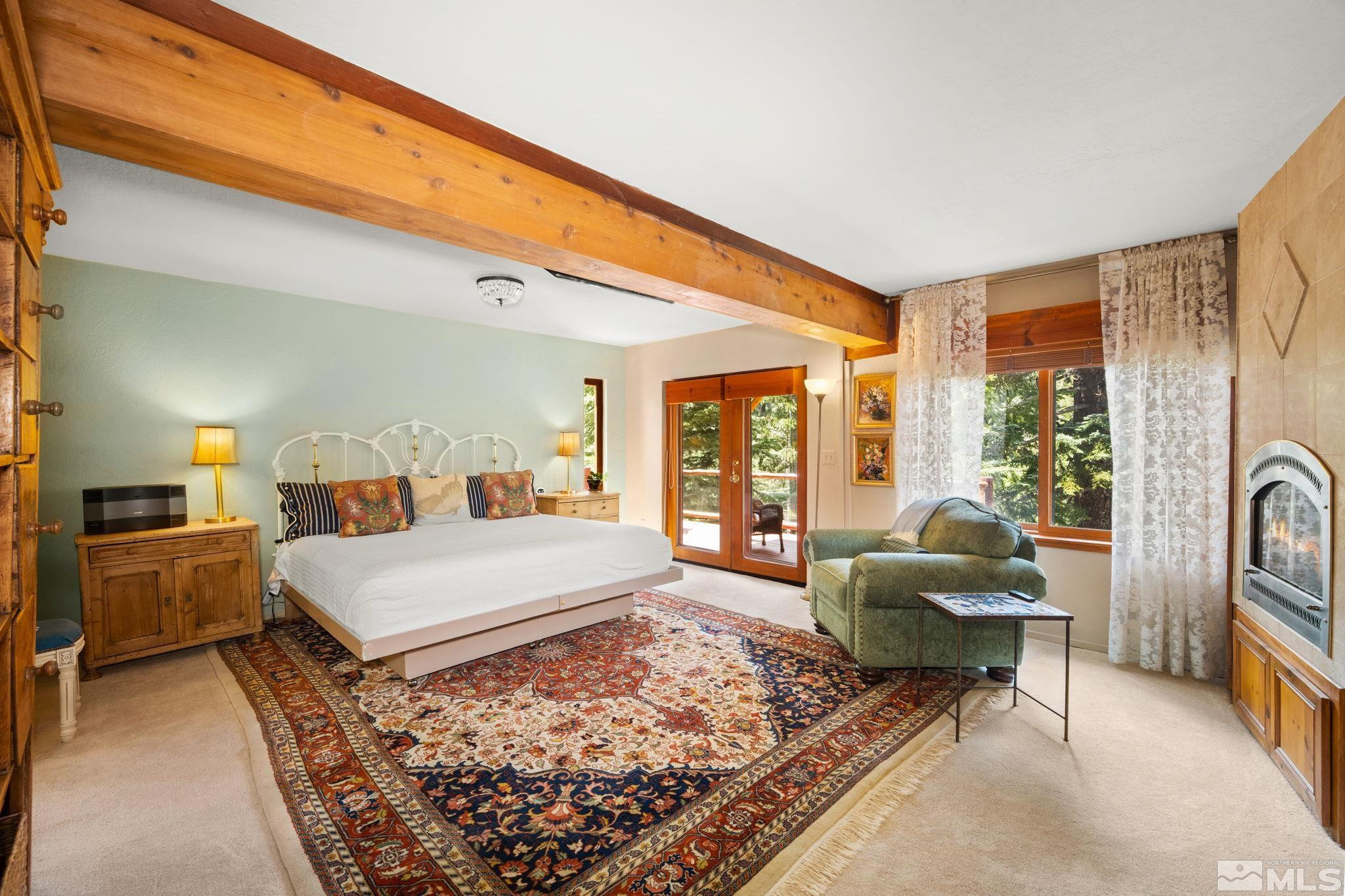 310 Barton Drive Stateline, NV 89449 - Photo 16 of 36 a living room with furniture and a rug