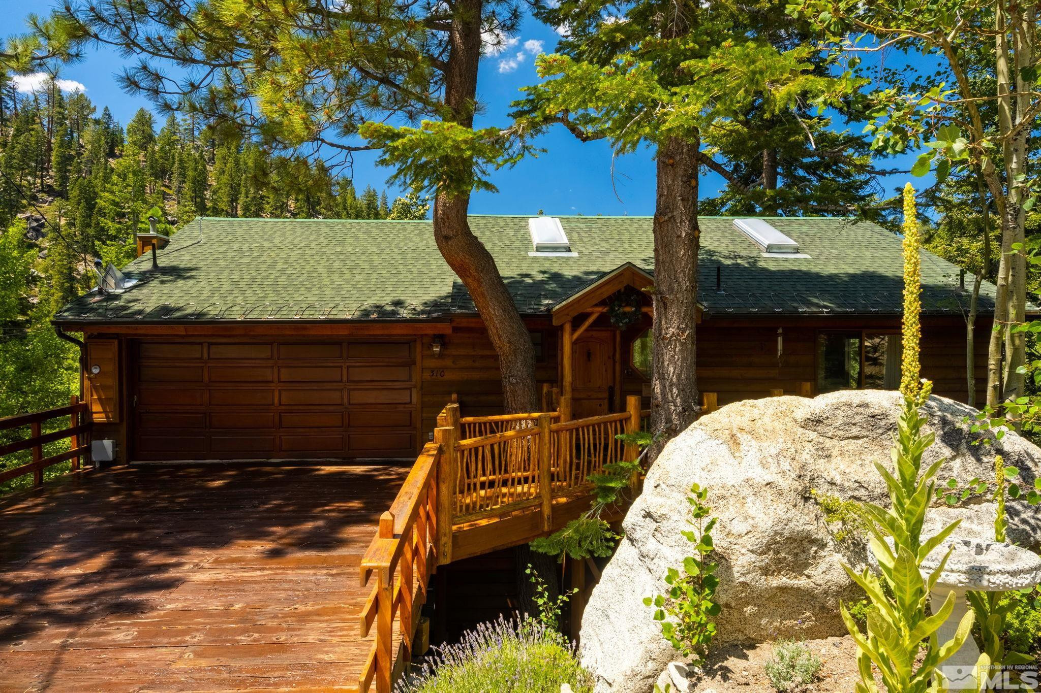 310 Barton Drive Stateline, NV 89449 - Photo 3 of 36 a view of a house with a yard