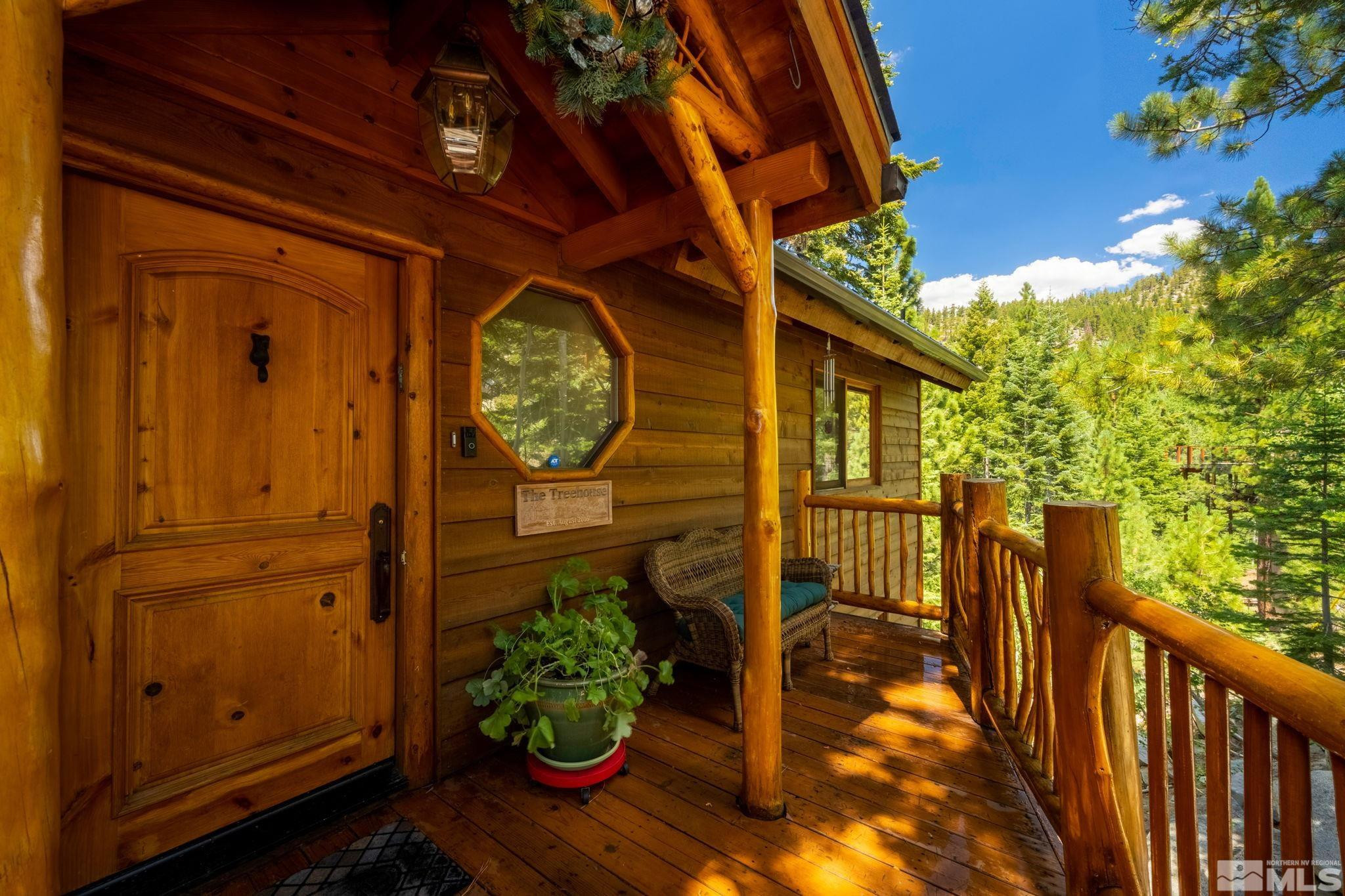 310 Barton Drive Stateline, NV 89449 - Photo 4 of 36 a view of a house with a flower garden
