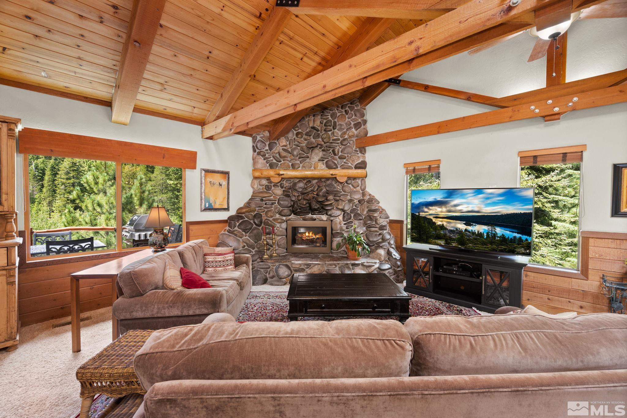 310 Barton Drive Stateline, NV 89449 - Photo 8 of 36 a living room with furniture fireplace and flat screen tv