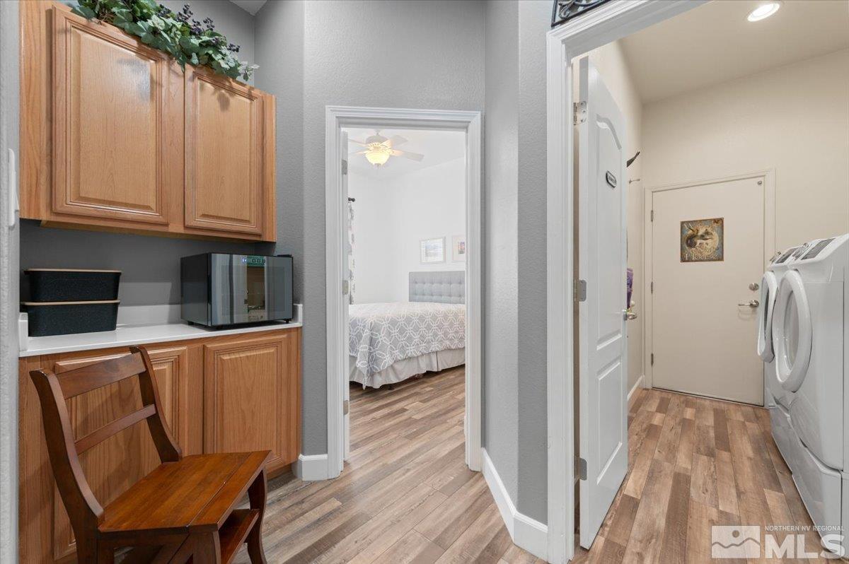 10754 Misty Meadows Drive Reno, NV 89521 - Photo 24 of 29 a view of walk in closet with wooden floor