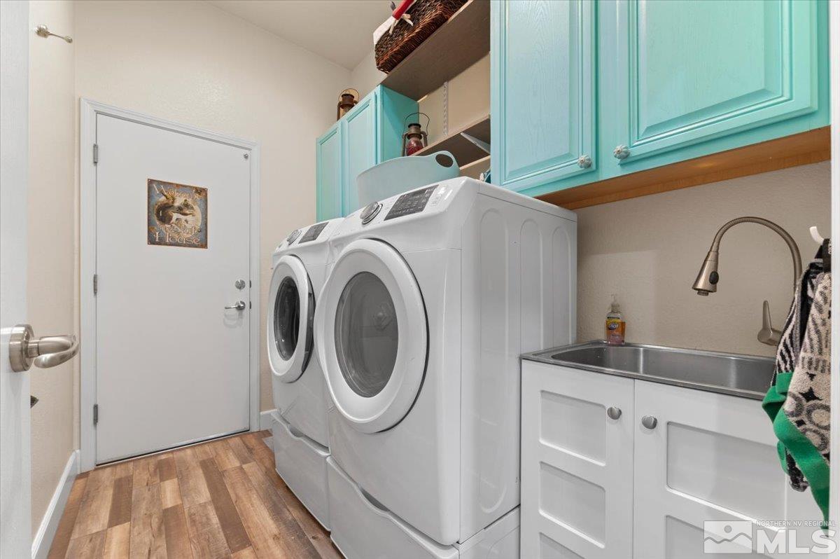 10754 Misty Meadows Drive Reno, NV 89521 - Photo 25 of 29 a utility room with sink dryer and washer