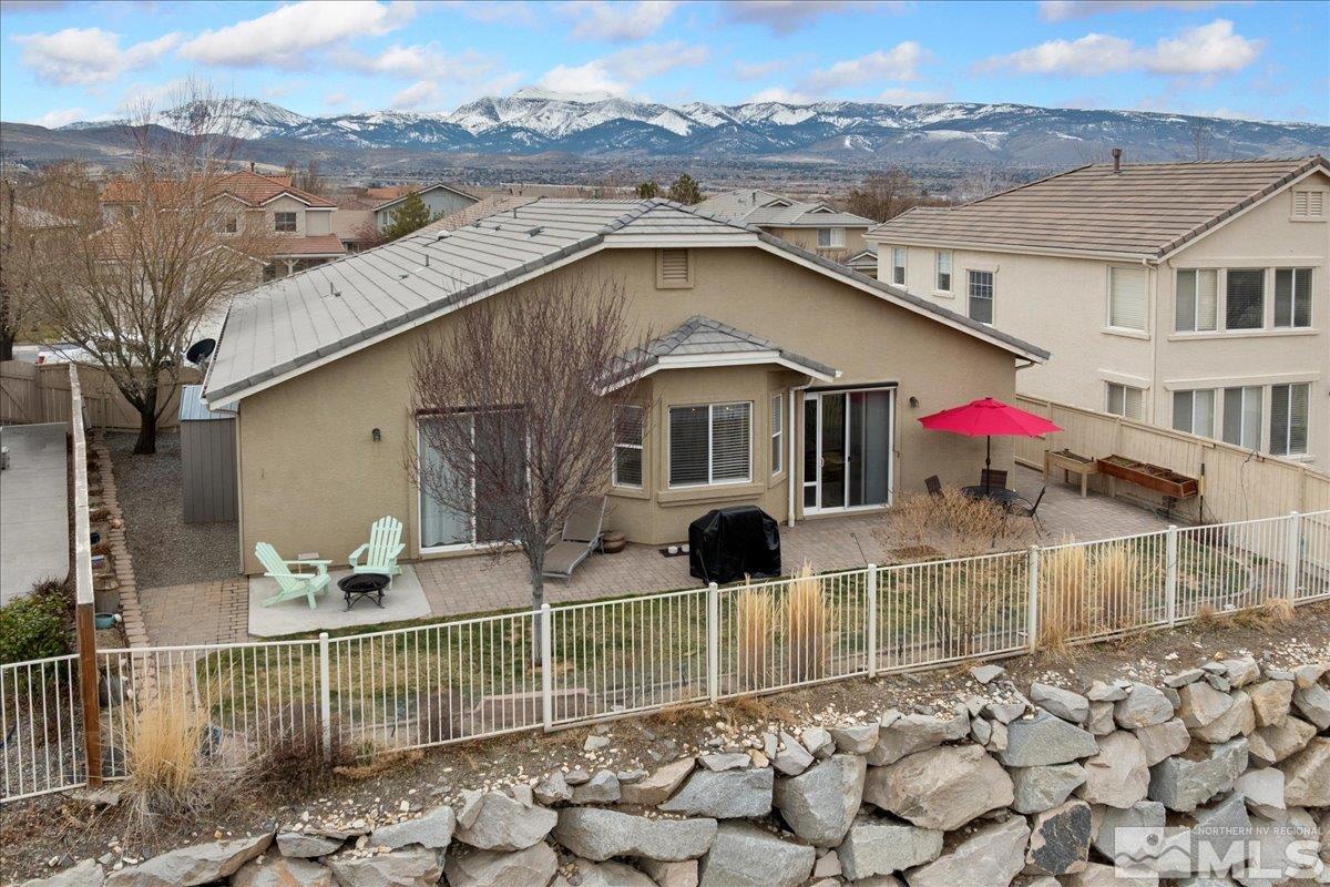 10754 Misty Meadows Drive Reno, NV 89521 - Photo 28 of 29 a view of a house with a yard