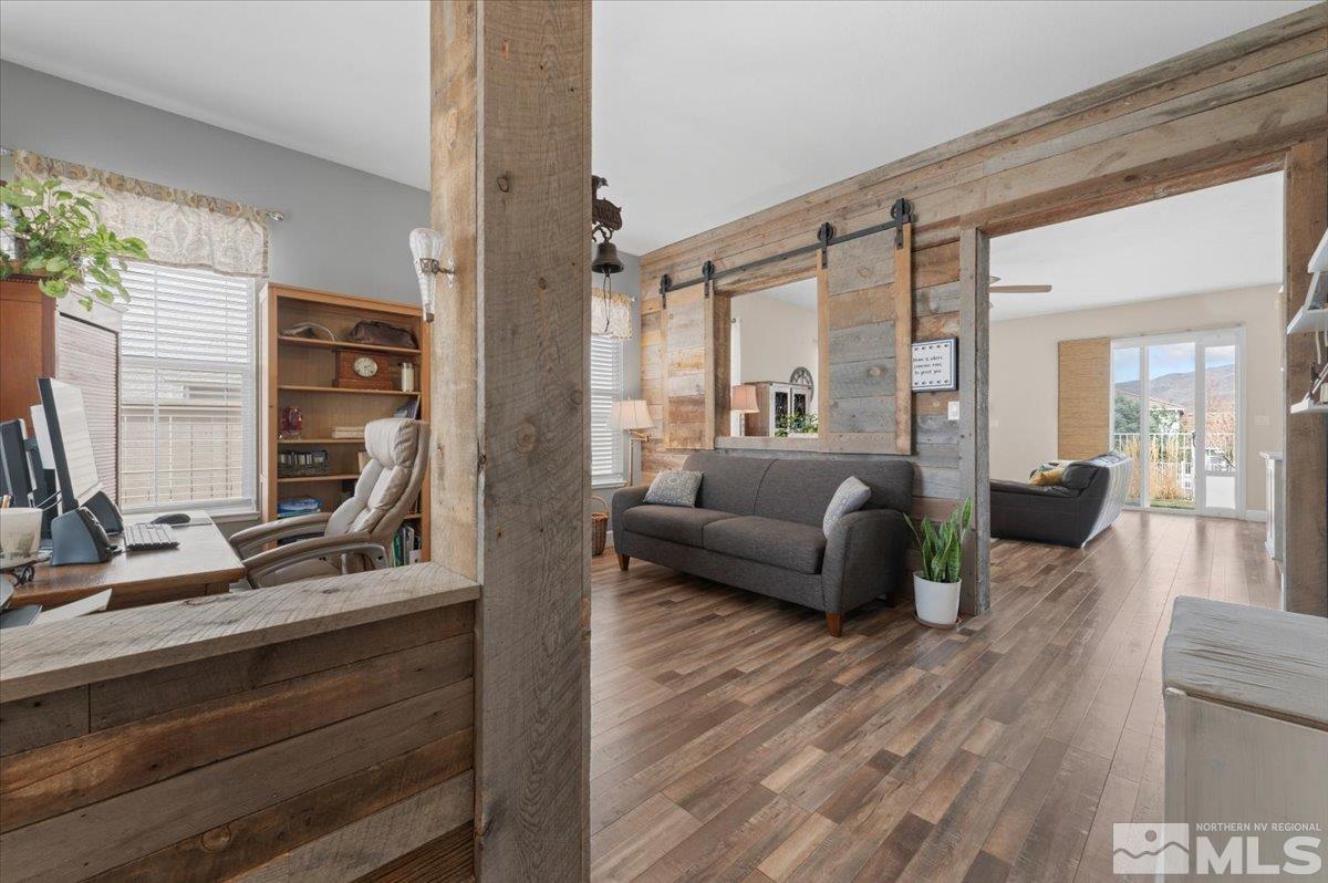 10754 Misty Meadows Drive Reno, NV 89521 - Photo 4 of 29 a living room with furniture and a large window