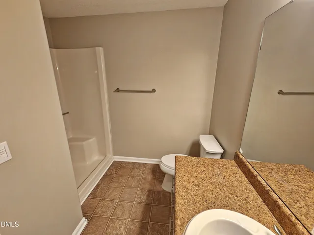 a view of a bathroom from a bathroom