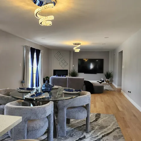 a room with a couch and a flat screen tv