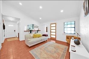 7301 Quicksilver Circle Austin, TX 78744 - Photo 2 of 15 a bedroom with furniture and a wooden floor