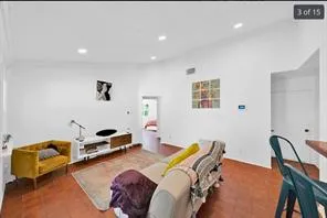 a bedroom with furniture and a couch