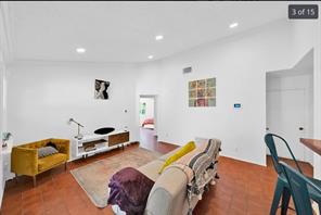 7301 Quicksilver Circle Austin, TX 78744 - Photo 4 of 15 a bedroom with furniture and a couch