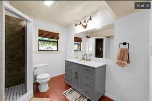 7301 Quicksilver Circle Austin, TX 78744 - Photo 9 of 15 a view of bathroom with dual sinks