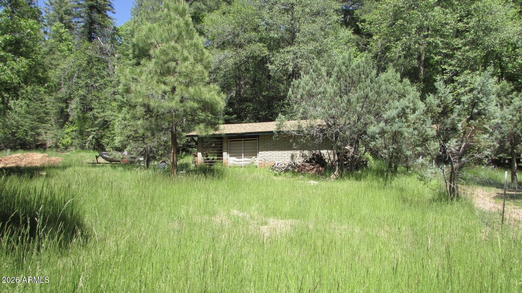 415 East Rim Estates Trail Payson, AZ 85541 - Photo 64 of 76 a view of a lake with a big yard