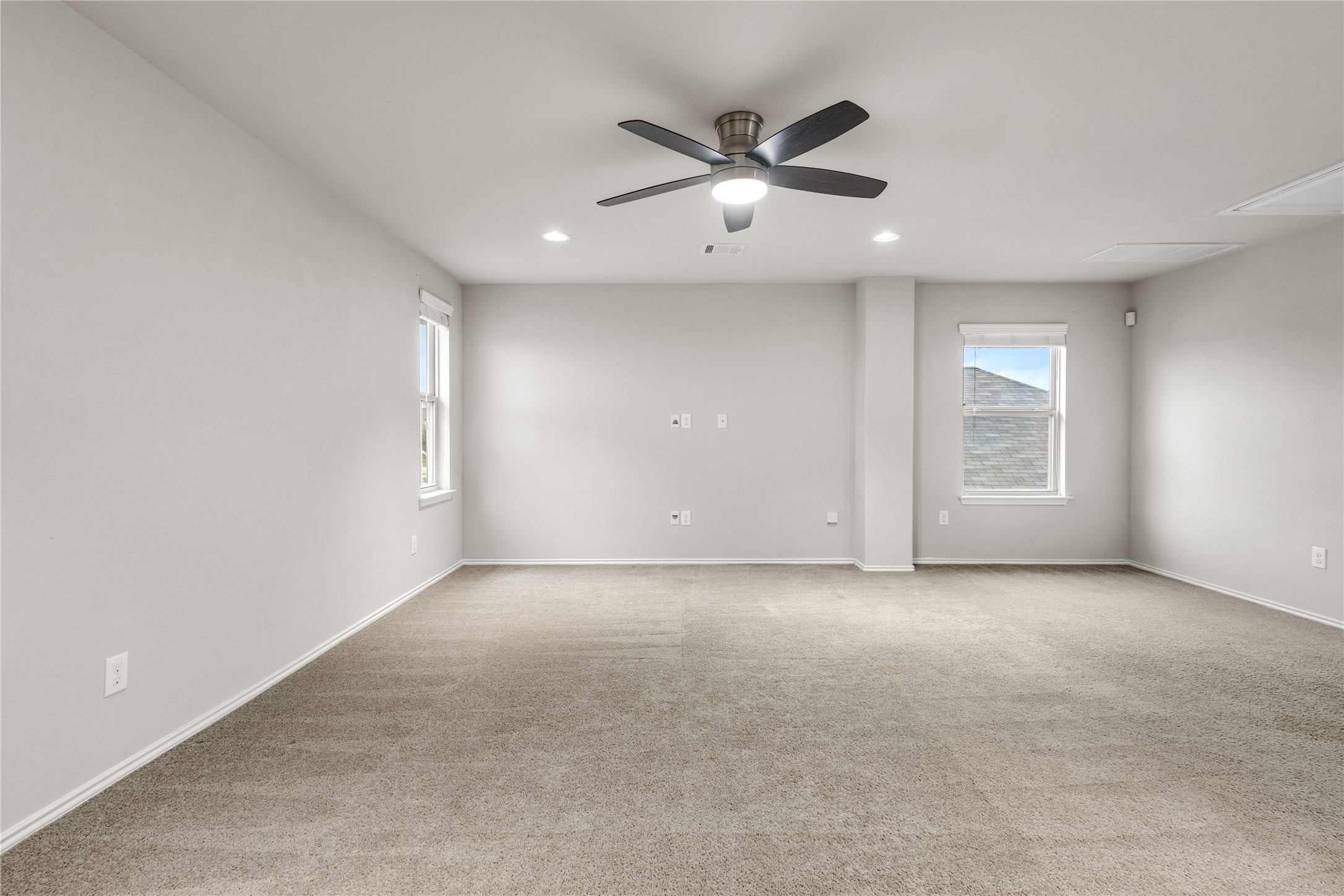 397 Limerick Road Buda, TX 78610 - Photo 21 of 33 Whether you need a dedicated workspace, a playroom, or a cozy cinema nook, this bonus room is ready to adapt to your lifestyle.