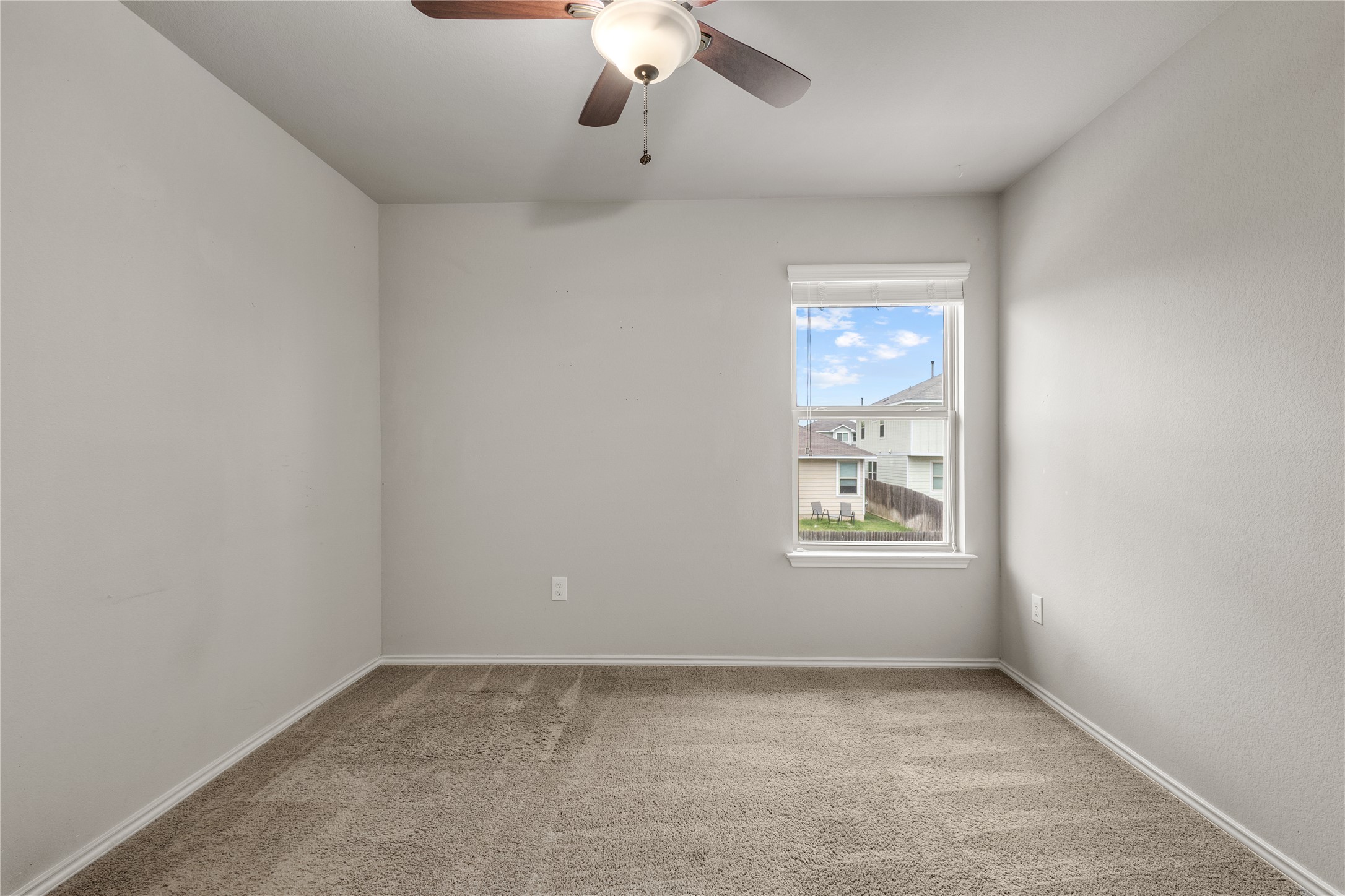 397 Limerick Road Buda, TX 78610 - Photo 27 of 33 With large windows, these rooms are ready to become an additional bedroom, a focused home office, or a welcoming guest suite.