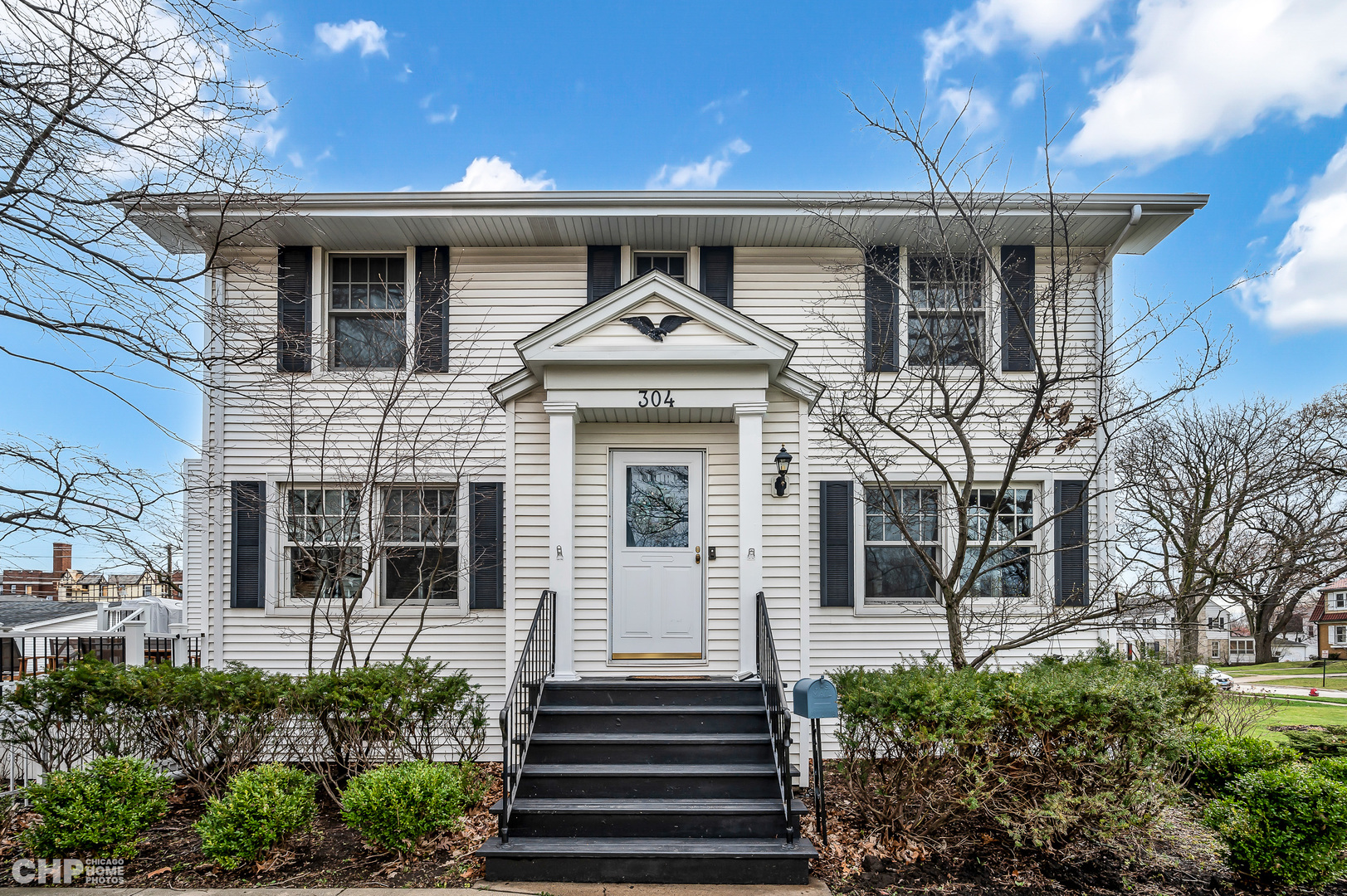304 Maplewood Road Riverside, IL 60546 - Photo 1 of 38 a front view of a house with a yard
