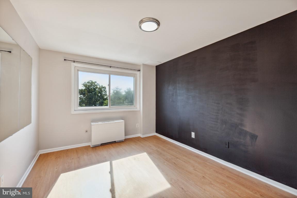 5101 8th Road South, Unit 310 Arlington, VA 22204 - Photo 22 of 28 a view of an empty room with a window