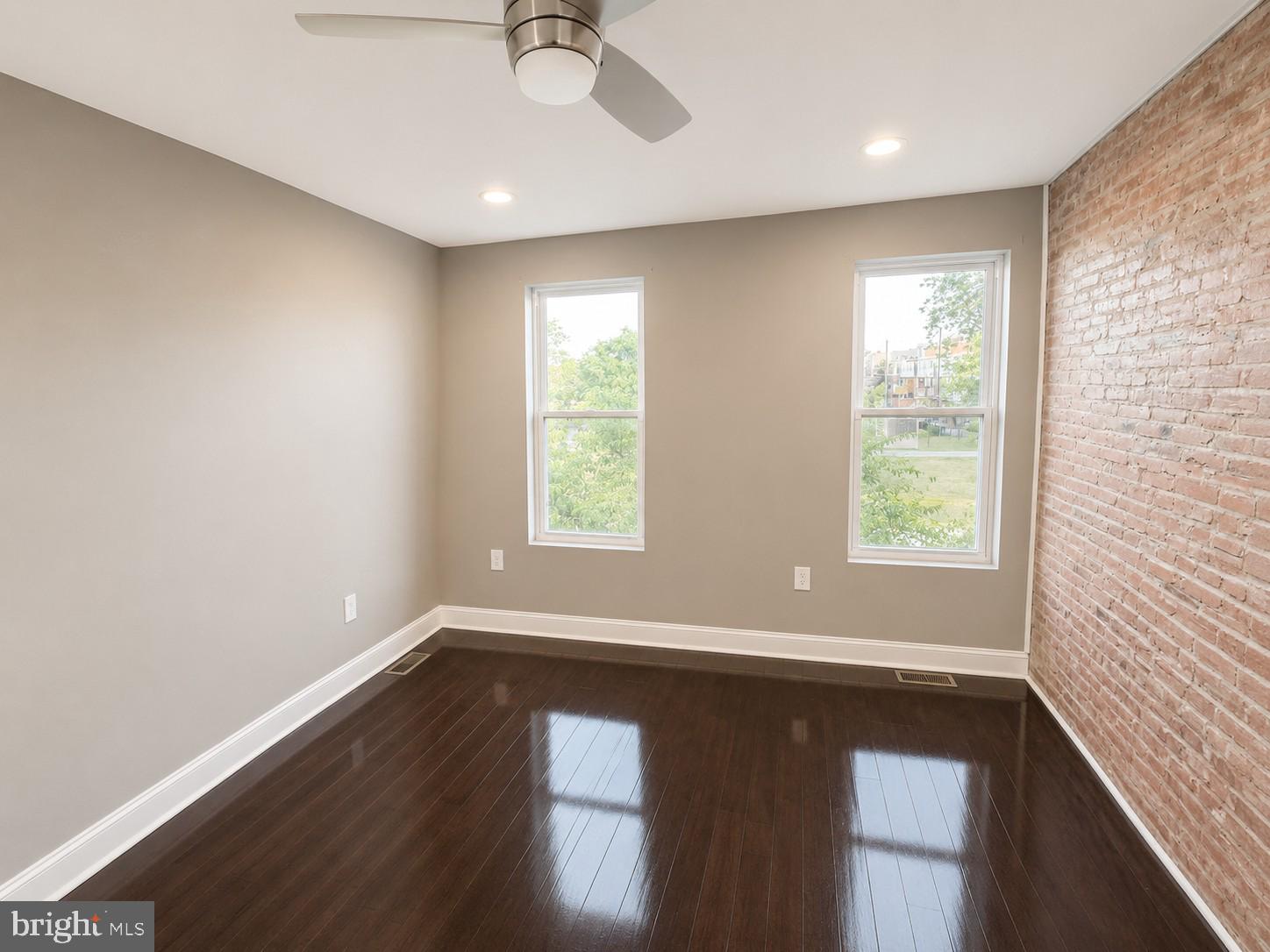 1610 Federal Street Baltimore, MD 21213 - Photo 16 of 27 Modern space with exposed brick charm.