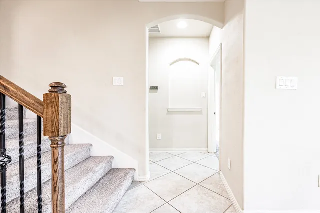 a view of staircase with large window