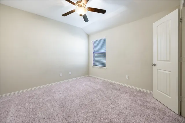 a bathroom with a double vanity sink toilet and shower