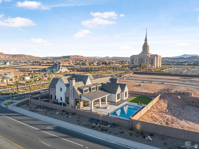 1468 South Red Cliffs Temple Lane St. George, UT 84790 - Photo 56 of 64 Aerial view of a mountainous background and a pool area