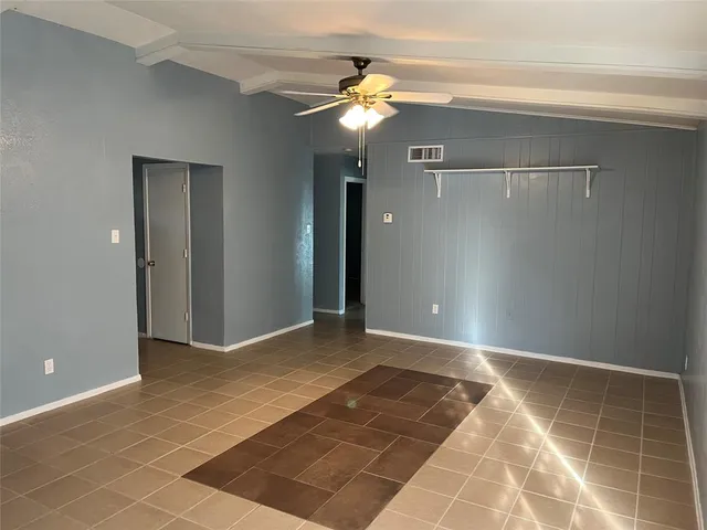 a view of a hallway with a chandelier