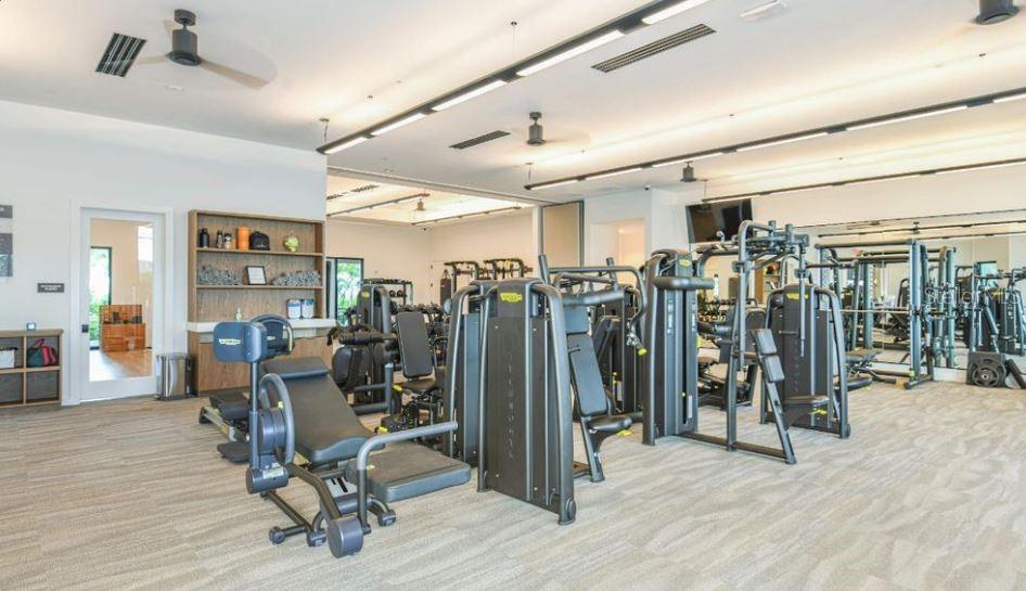 5357 Spoonflower Court St. Cloud, FL 34771 - Photo 7 of 8 a view of a room with gym equipment