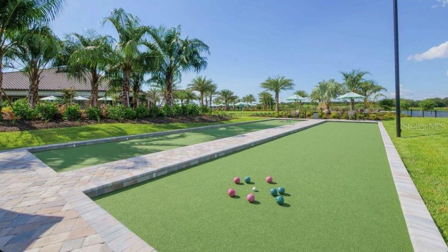 5357 Spoonflower Court St. Cloud, FL 34771 - Photo 8 of 8 a view of a golf course with a garden