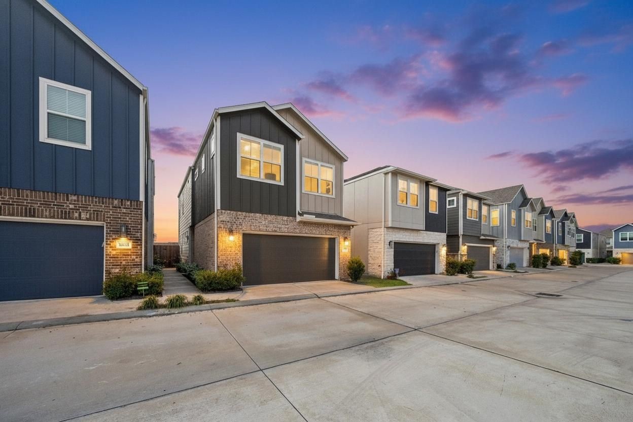 9817 Prairie Garden Lane Houston, TX 77080 - Photo 2 of 36 a view of a building with many windows