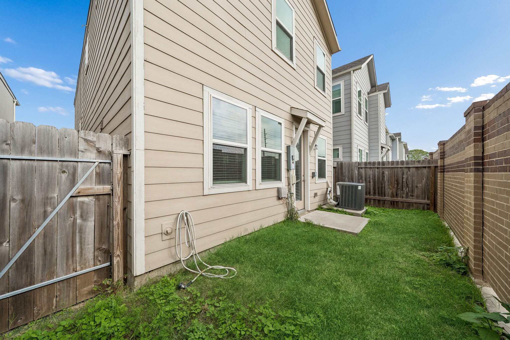 9817 Prairie Garden Lane Houston, TX 77080 - Photo 24 of 36 a view of backyard with house