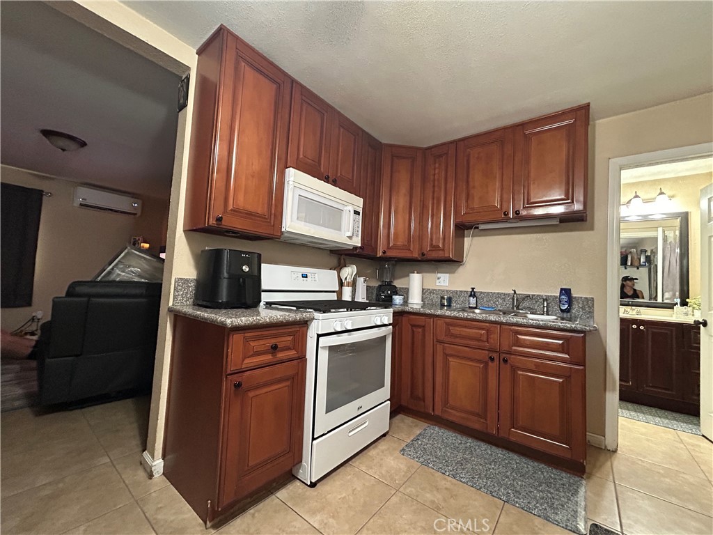 10351 Wells Avenue, Unit 1 Riverside, CA 92505 - Photo 21 of 37 Back Unit-Kitchen