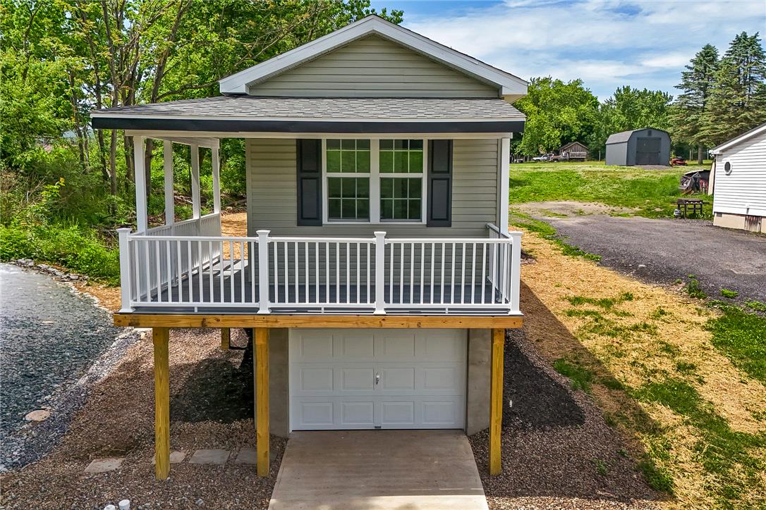 624 Main Road Lehighton, PA 18235 - Photo 1 of 42 A charming compact residence offers a welcoming front porch and a convenient garage below.