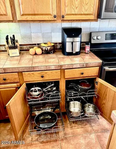 a view of a swimming pool and an outdoor space