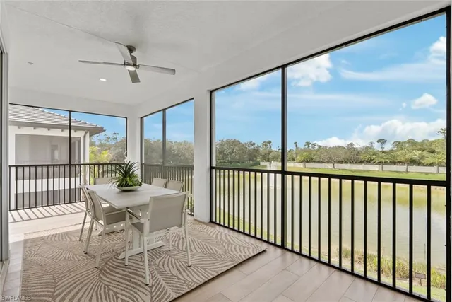 a utility room with cabinets washer and dryer