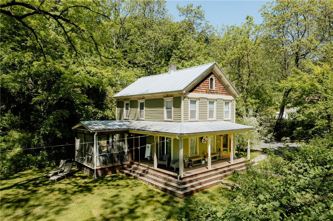 594 Hickory Bush Road Kingston, NY 12401 - Photo 1 of 1 View of front of property with a front lawn and a sunroom