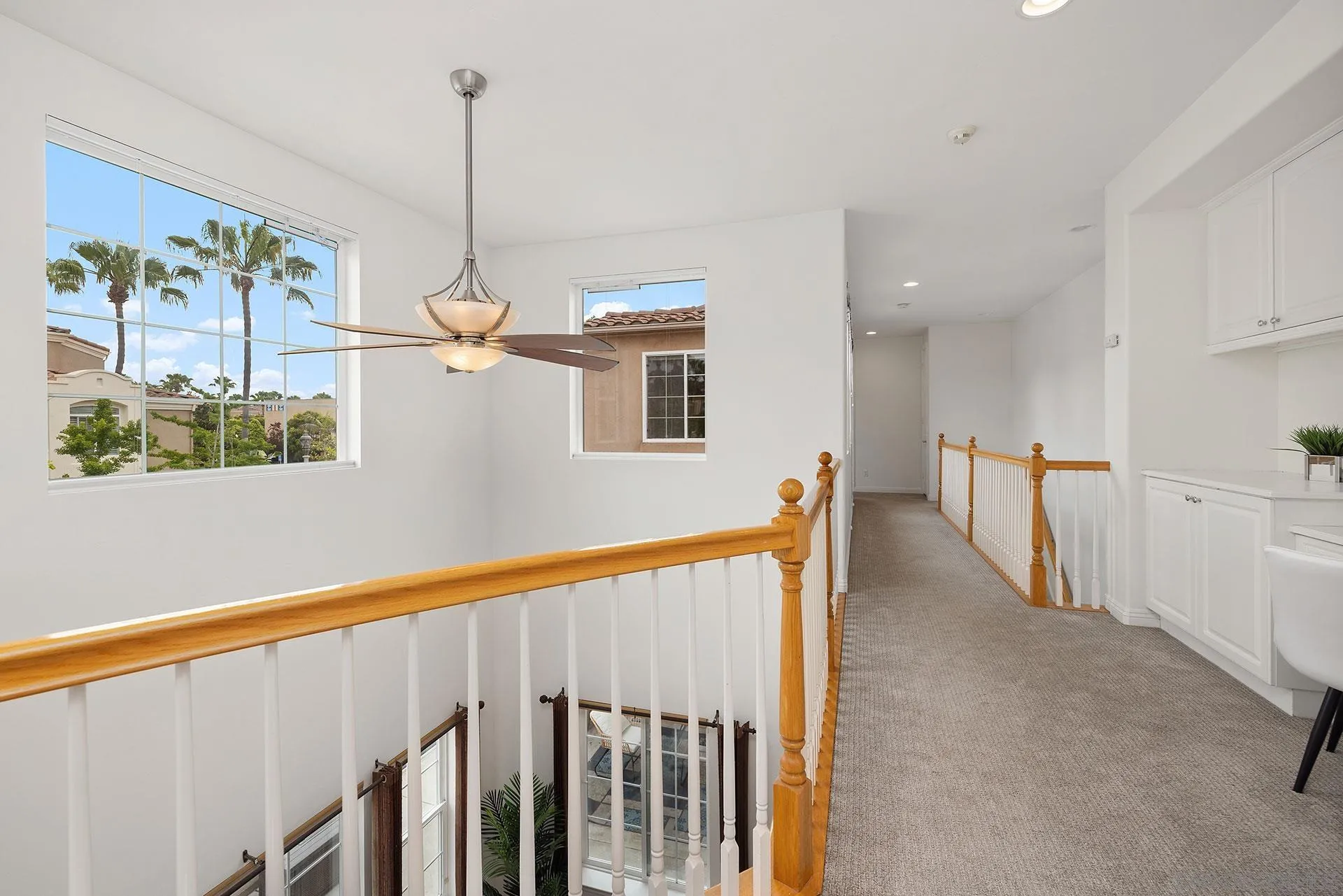 2149 Historic Decatur Road San Diego, CA 92106 - Photo 27 of 32 a view of a hallway with windows