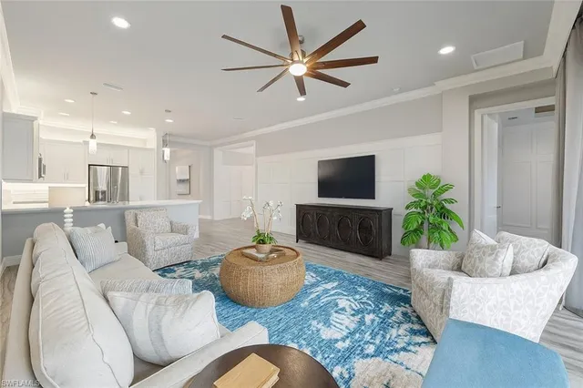 a spacious bedroom with a bed and a large window