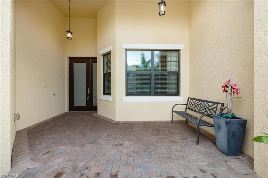 13418 Silktail Drive Naples, FL 34109 - Photo 36 of 36 a view of an empty room with a window