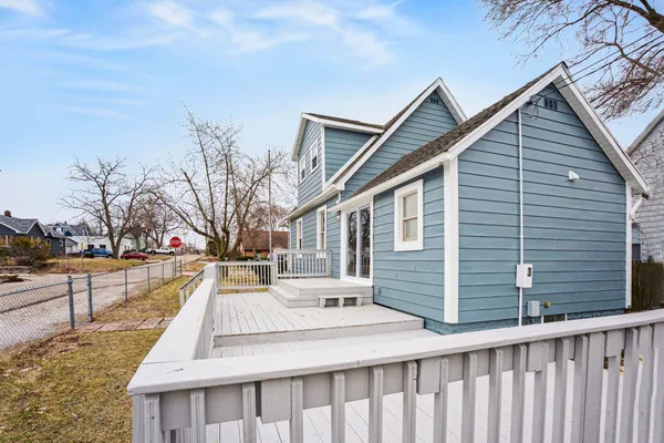 a view of a house with snow on the wall