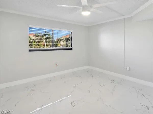 en empty room with windows