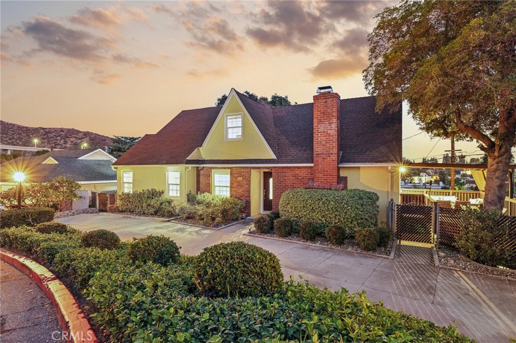 647 Corwin Avenue Glendale, CA 91206 - Photo 1 of 1 a front view of a house with a yard