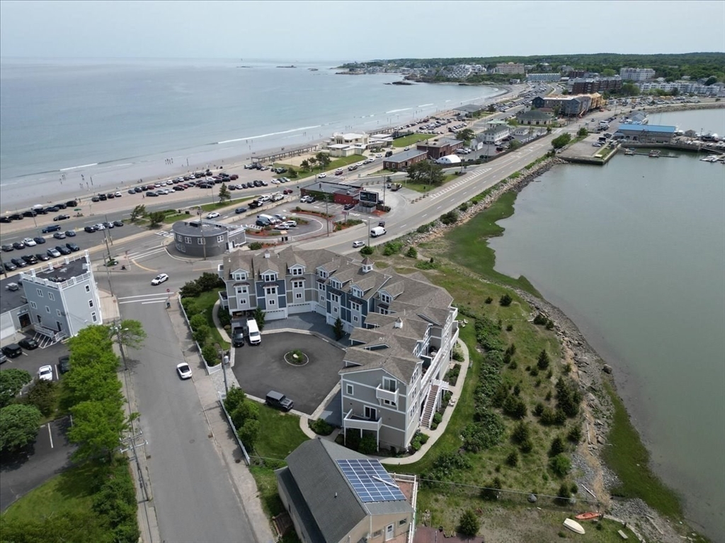 7 Bay Street, Unit 3 Hull, MA 02045 - Photo 3 of 40 an aerial view of a city with ocean view
