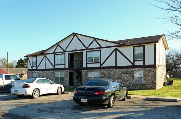a car parked in front of a house